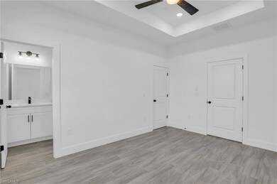 Empty room featuring light hardwood / wood-style f