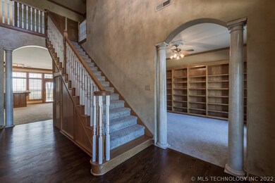 Inviting entryway with brand new hardwood floors.