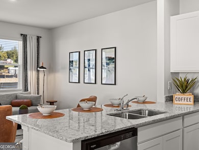 Pearson kitchen open to the living and dining area