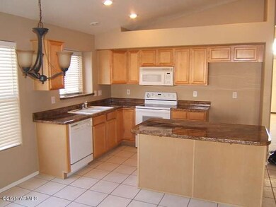 nice kitchen with hard top counters