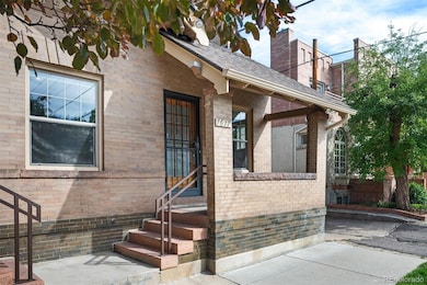 Welcome to 1617 E. 5th. Imagine drinks on the porch watching the seasons change!