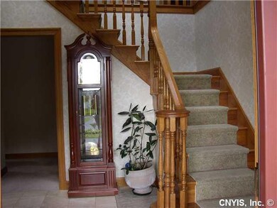 Foyer TWO STORY FOYER TO GREET GUESTS WITH NEUTRAL
