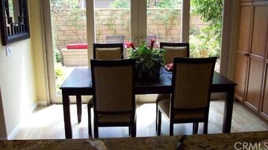 Dining room opens to spacious side yard through sl
