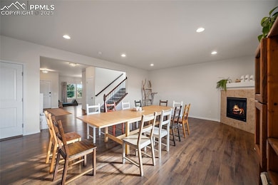 Gas fireplace with luxury vinyl plank flooring.