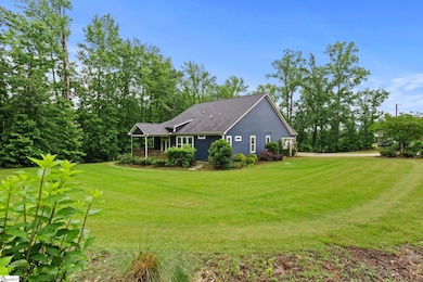 1.54 Acre sodded yard with Full irrigation & shrub
