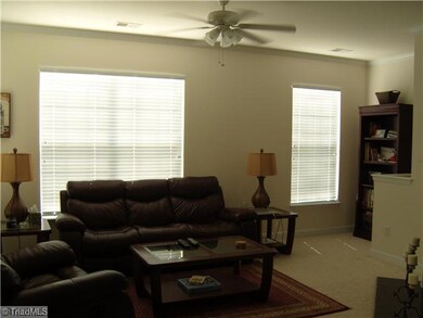 Den/Family/Great Room. Bright Open Family Room with Ceiling Fan~Fireplace~Crown Moldings