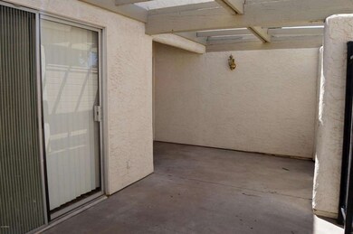 Large front patio with 2 arcadia doors