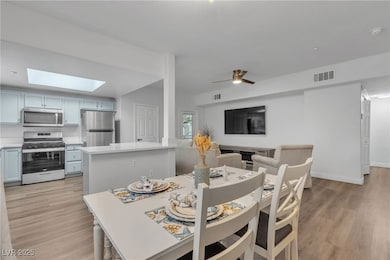 Dining area featuring light wood-style flooring, a