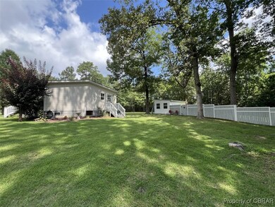 View of yard featuring view of wooded area