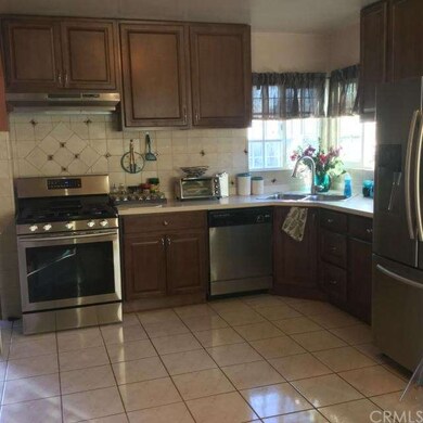Kitchen with Corian Counters & Maple Cabinets