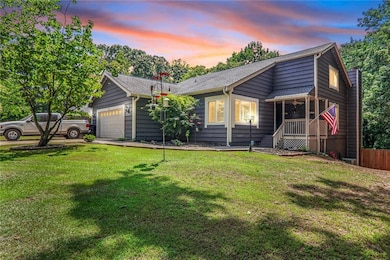 View of front of property with a garage