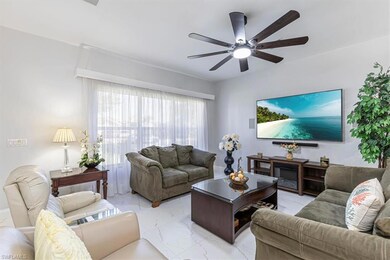 Living area with a ceiling fan