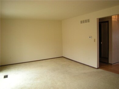 Living Room. THe big living room has a light, brig