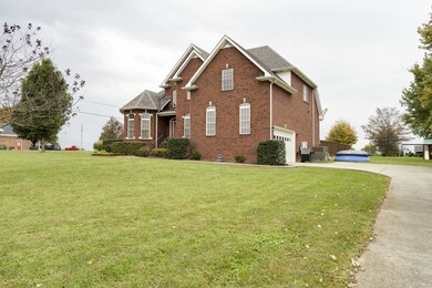 Plenty of parking with garage and driveway
