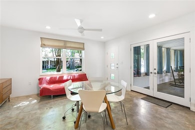 Dining space in kitchen leading to the living spac