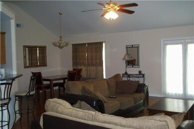 FAMILY/LIVING ROOM WITH FIREPLACE  WILL HOLD 