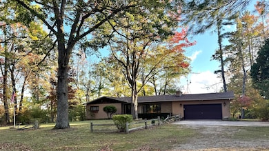 568 N Weaver Rd, Fairview, MI 48621 - photo 3