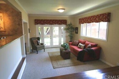 Sunken Family Room with Media Cubby with French Do