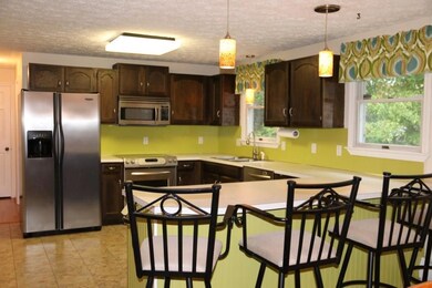 Bright and sunny the kitchen looks...