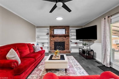 Gas log fireplace and built-in shelving
