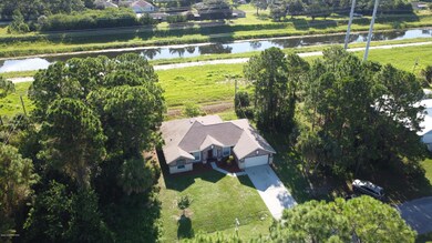 1278 SEELEY CIR & MELBOURNE TILLMAN CANA