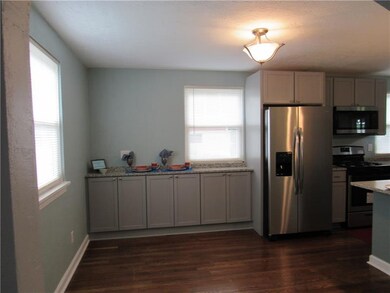 Gleaming original hard wood floors though out the 