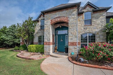 View of front of house featuring a front lawn