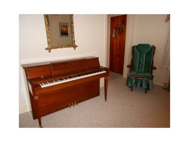 Living Room. DEN THAT WAS AT 1 TIME A MASTER ON FI