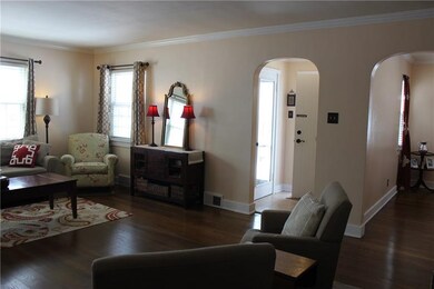 View of LR into entry way with marble floor and fr