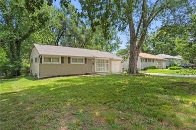 Ranch-style house with a front yard