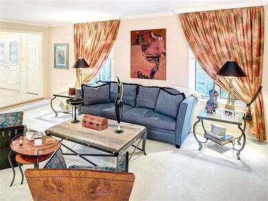Sunken living room and foyer.
