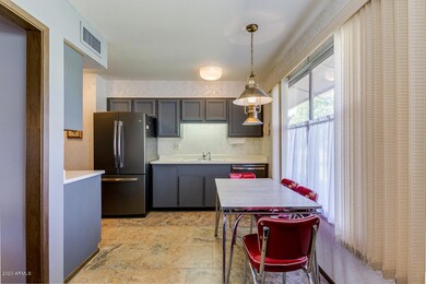 9862 W Country Club Ct, Sun City, AZ 85373 - photo 7