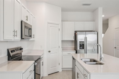 7621 Waterscape Dr, Groveland, FL 34736 - photo 3