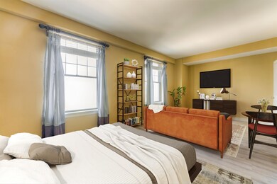 Bedroom featuring multiple windows and hardwood / 