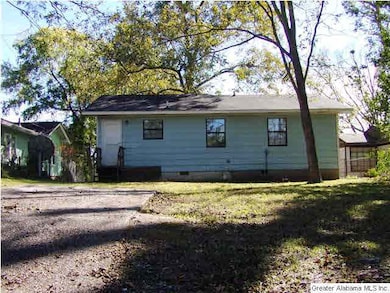 Looking from the alley toward the back of the hous