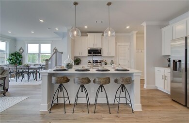 Kitchen with ornamental molding, stainless steel a
