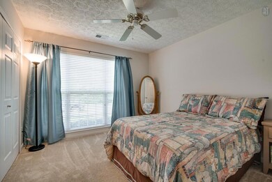 Second bedroom with triple window 