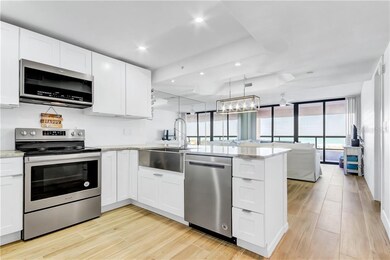 Beautifully updated kitchen with views of the beac