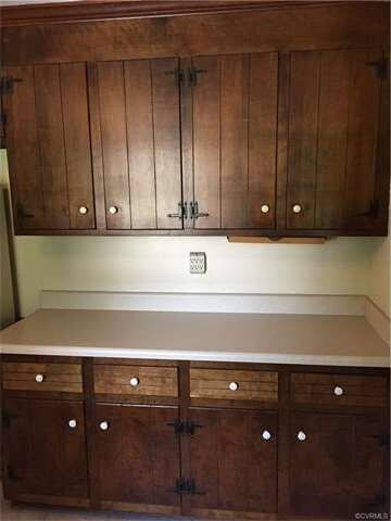 Lots of cabinets and counter top space.