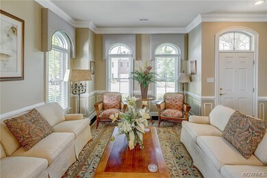 Formal Living Room with beautiful arched windows.