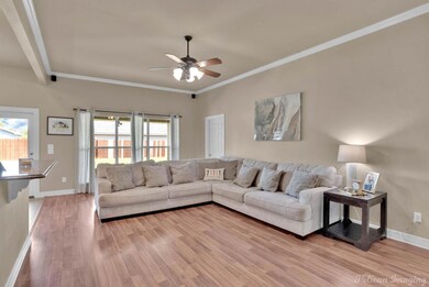 Living room with light wood-type flooring, ceiling