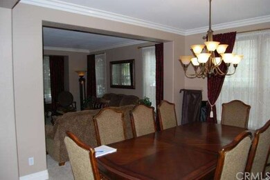 Dining room attached to living room.  Long Butlers