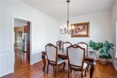 Formal dining room with picture frame molding, cro
