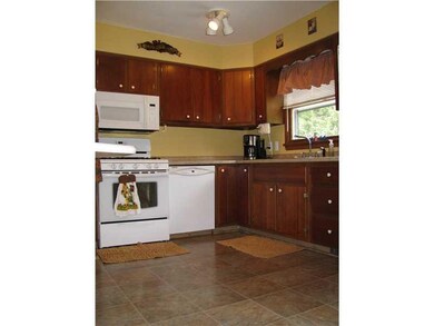 Kitchen. CHERRY CABINETS UPDATED FLOORING, COUNTER