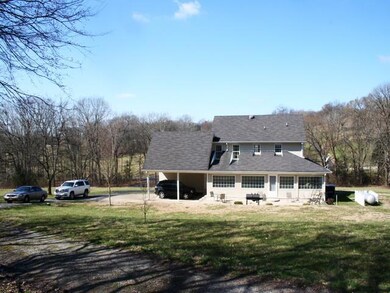 Back view of home built in 1993. Lots of privacy.