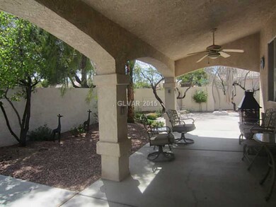 Property Photo. Covered patio and backyard