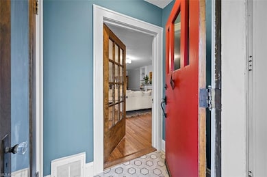 Welcoming foyer with new hexagon floor.