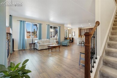 Living room featuring light hardwood / wood-style 
