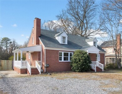 Cape cod home with covered porch