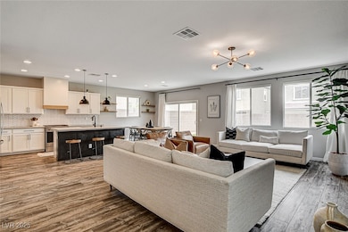 Living area featuring wood finished floors, recess